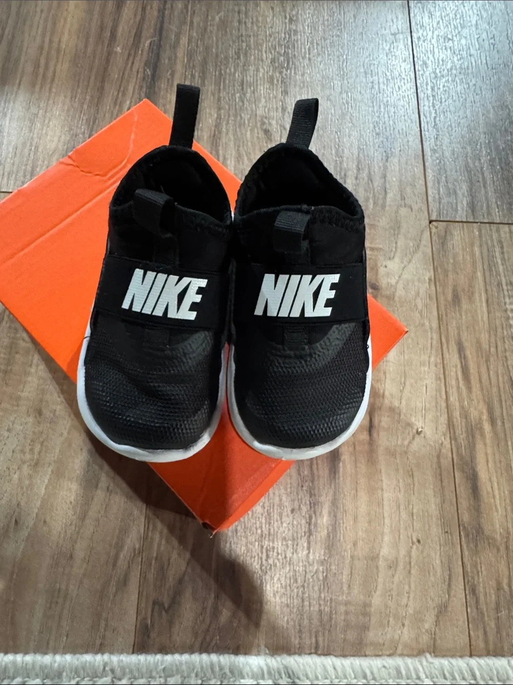 Nike Black and White Kids Slip-On Sneakers